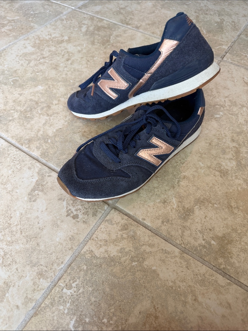 New Balance Women's Navy Sneakers with Metallic Rose Accents